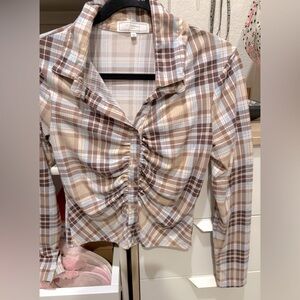 Excellent preowned, lots stretch.
Fits like medium w stretch fits Large